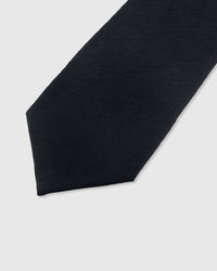 {Natural slub weave detail} Solid detail on midnight navy mulberry silk tie showing embroidered pattern by STICKYZOO