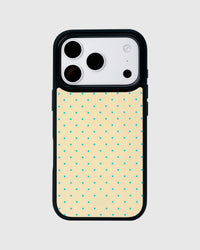 Back of the ginger cat phone case showing the cream ground and small teal polka dots on UV-printed ABS