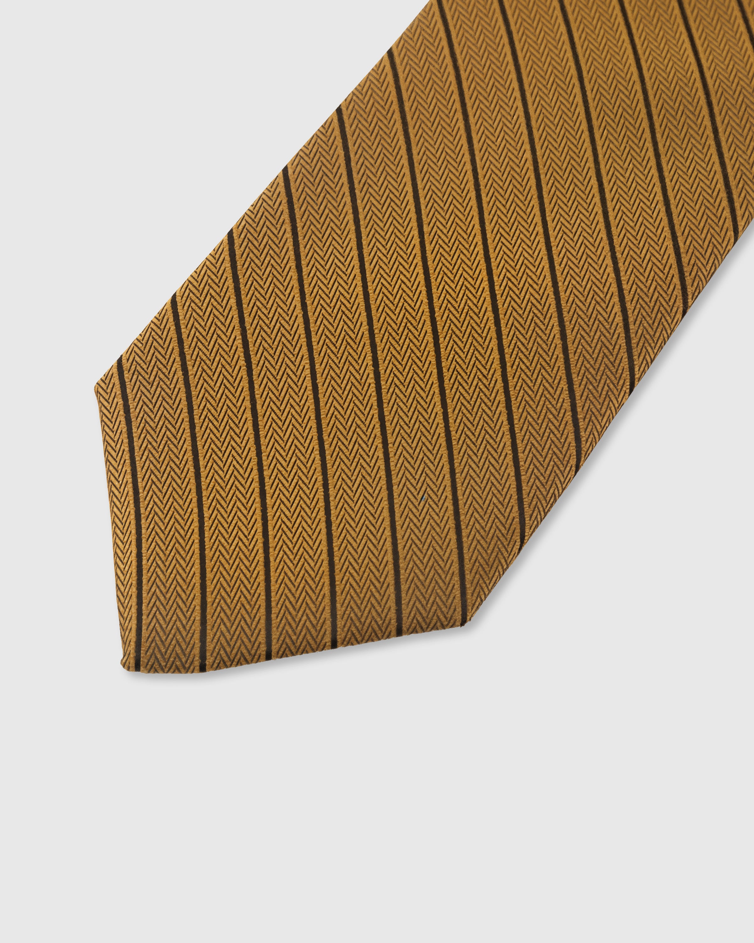 Charcoal pinstripe detail on amber mulberry silk tie showing herringbone weave texture by STICKYZOO