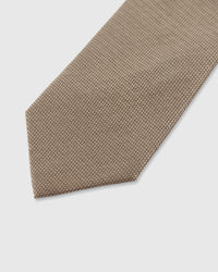 STICKYZOO Sand Lattice Tie — detail of hand-embroidered micro lattice on pure mulberry silk