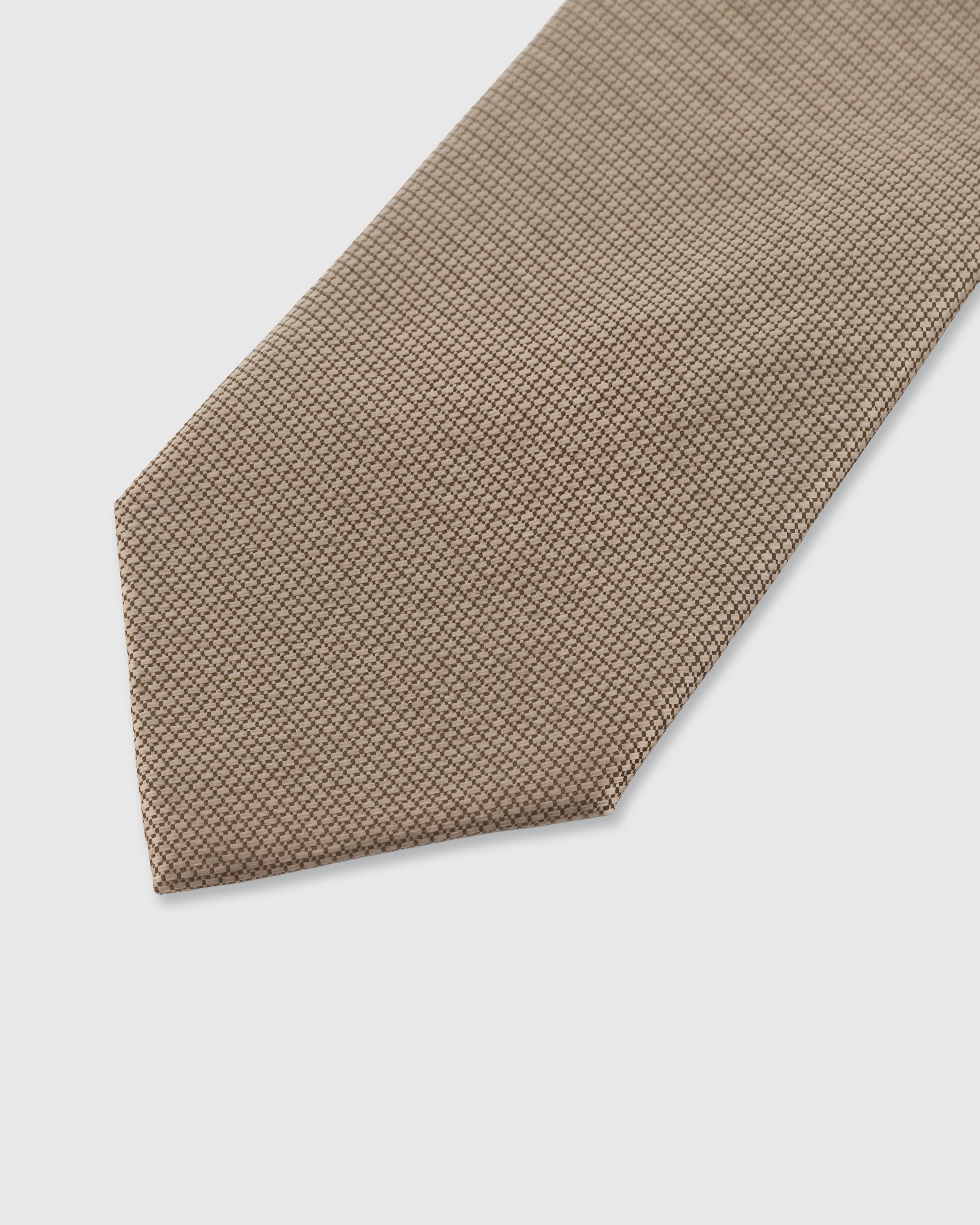 STICKYZOO Sand Lattice Tie — detail of hand-embroidered micro lattice on pure mulberry silk