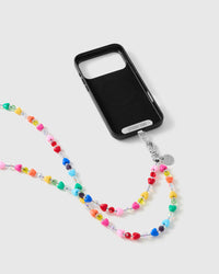 Rainbow heart-bead strap clipped to a black phone case with a silver-tone clasp and STICKYZOO connector tab, ready to wear cross-body.