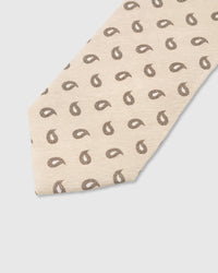 Walnut paisley drop detail on sand mulberry silk tie showing raised hand-embroidered motif by STICKYZOO