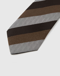 Tri-tone club stripe detail showing chocolate, cognac, and houndstooth weave on mulberry silk by STICKYZOO