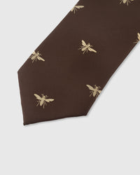 Gold bee motif detail on cocoa mulberry silk tie showing raised hand-embroidered wings and body by STICKYZOO