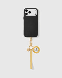 Close-up of vintage-style translucent yellow chip charm with hand-set gold rim accents