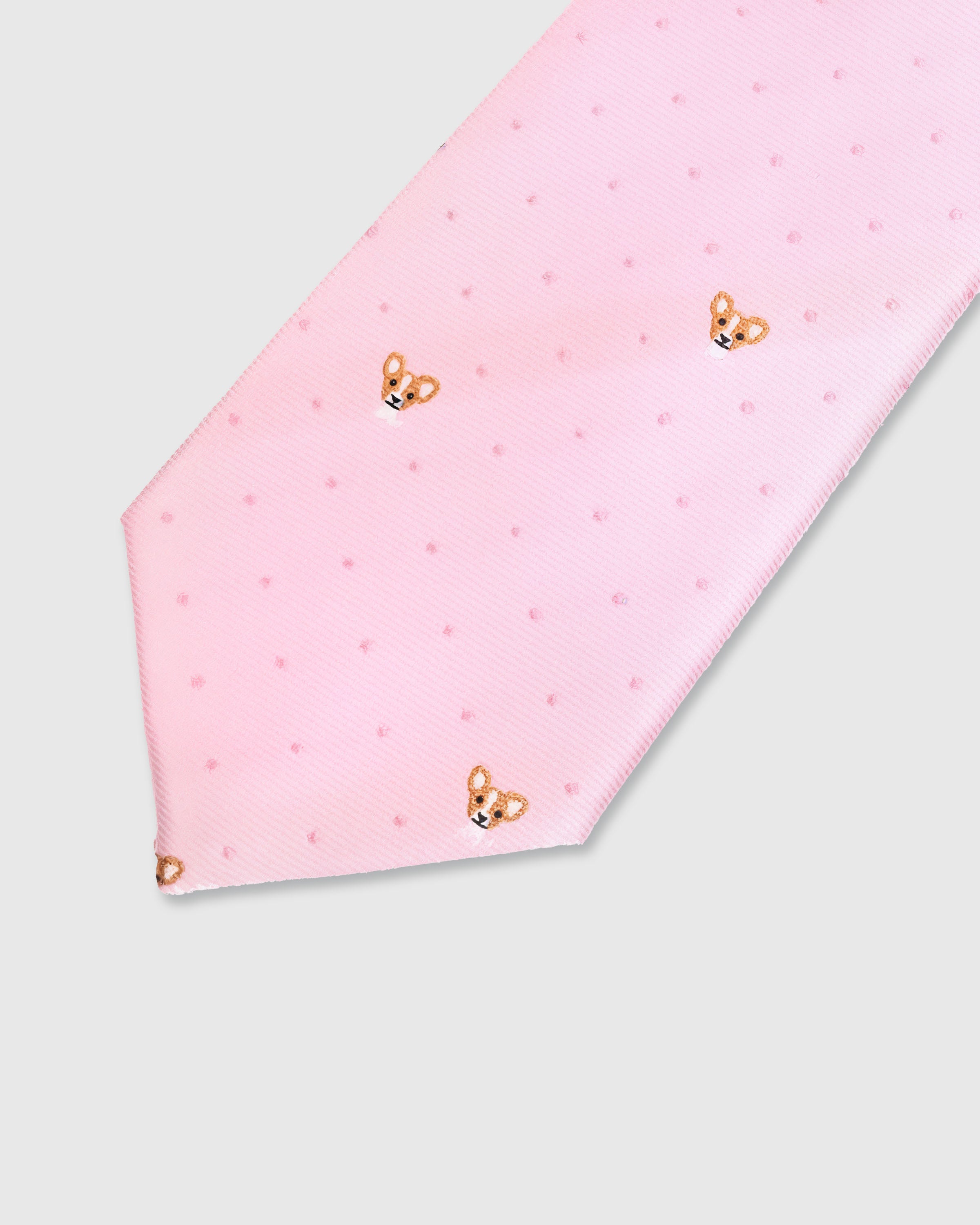 {Embroidered corgi detail} Corgi detail on rosebud pink mulberry silk tie showing embroidered pattern by STICKYZOO