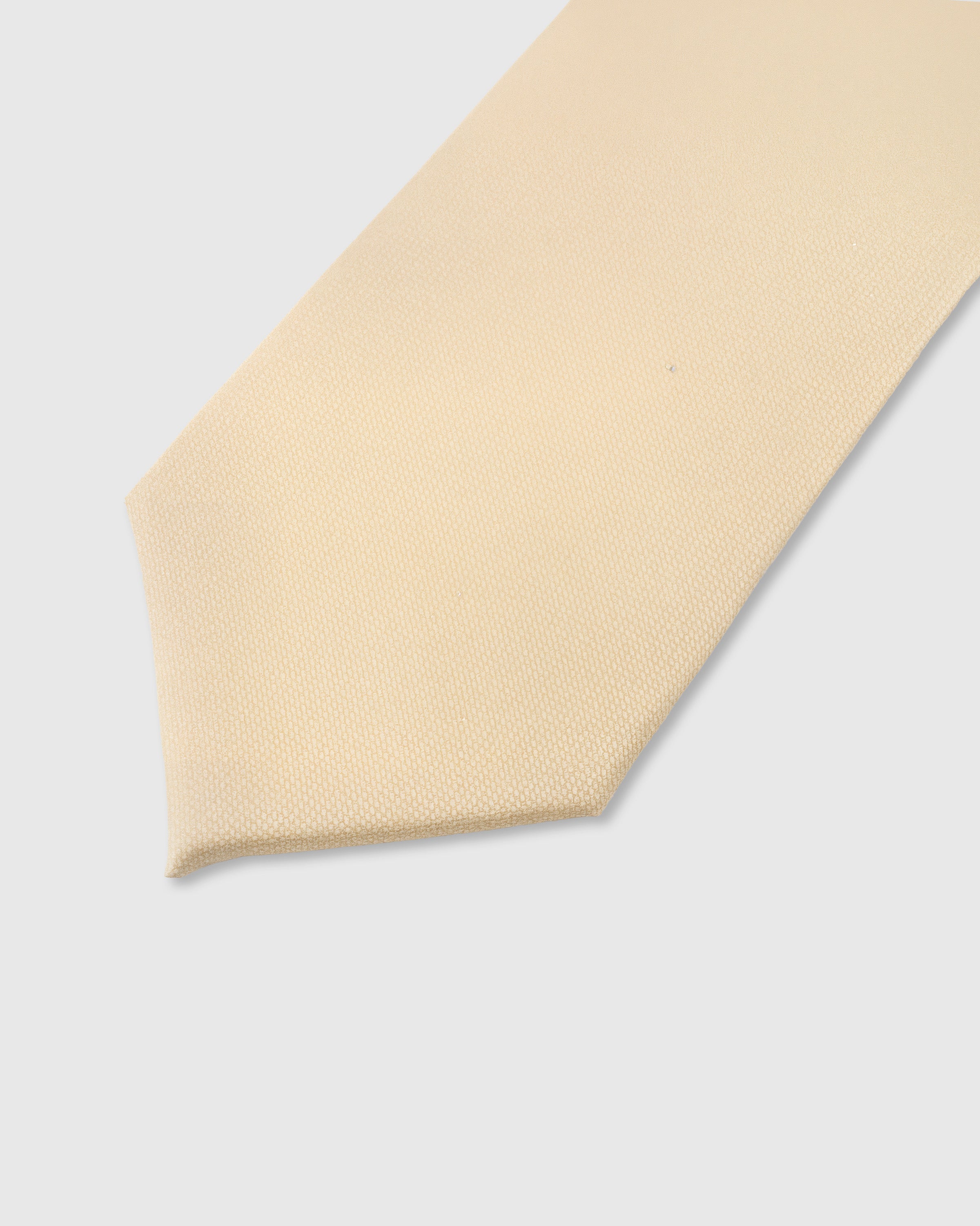 Tonal basket weave detail on champagne mulberry silk tie showing textured pique surface by STICKYZOO