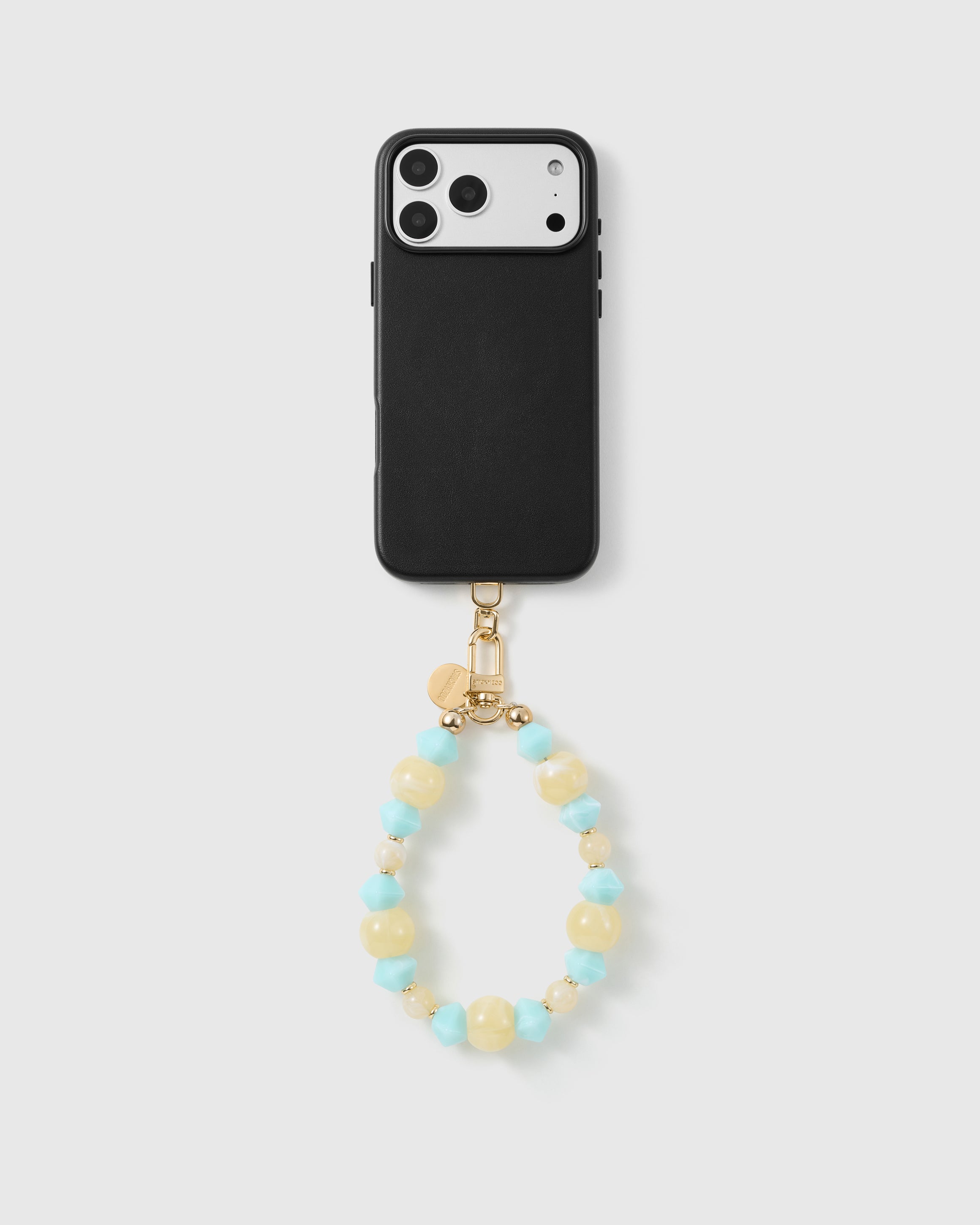 Handmade beaded phone strap on a black case, rated 4.9 across 5,000+ reviews