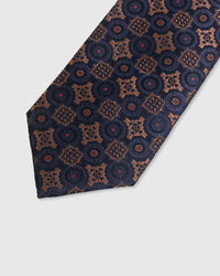 {Embroidered medallion mosaic detail} Medallion mosaic detail on midnight navy mulberry silk tie showing embroidered pattern by STICKYZOO