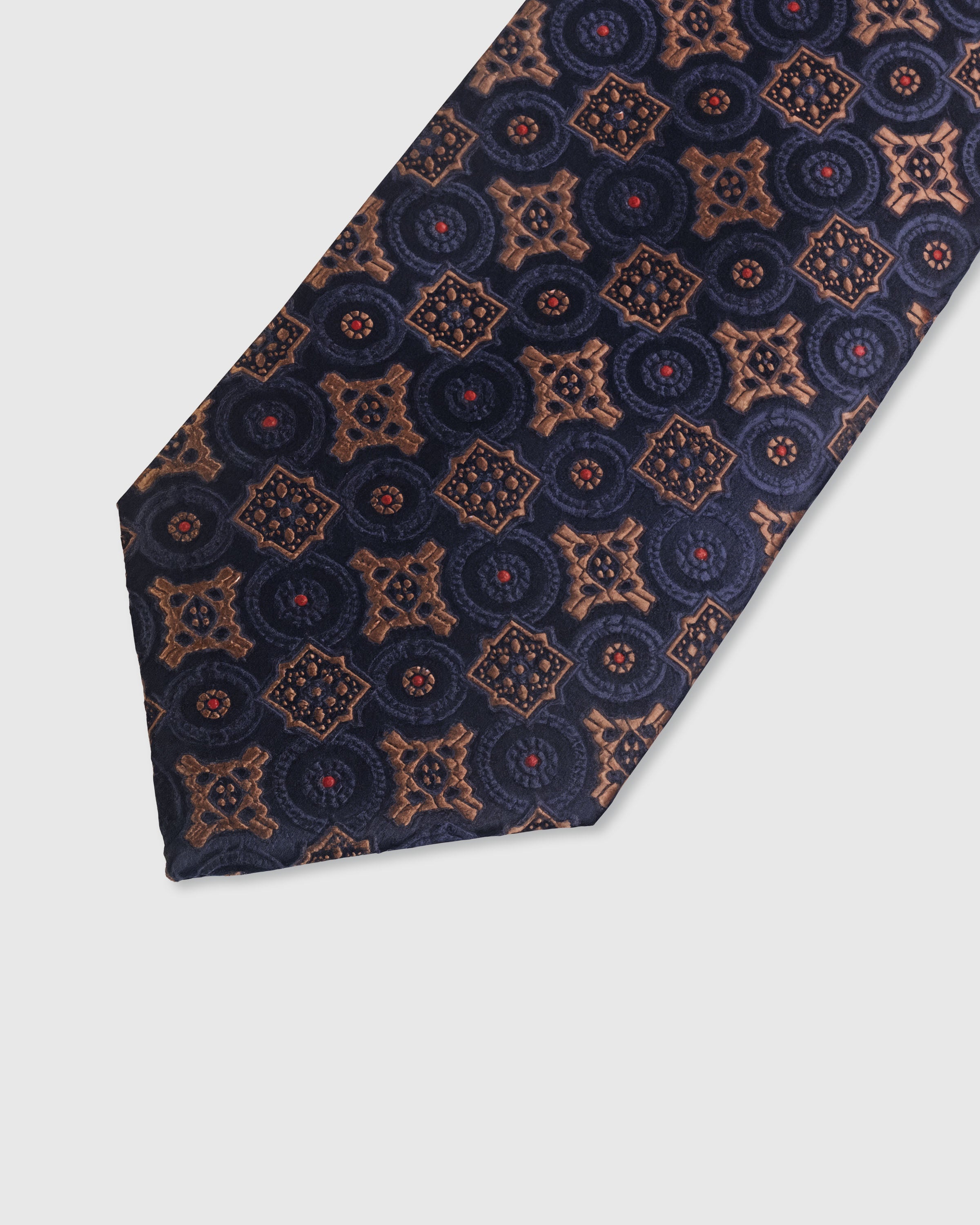 {Embroidered medallion mosaic detail} Medallion mosaic detail on midnight navy mulberry silk tie showing embroidered pattern by STICKYZOO