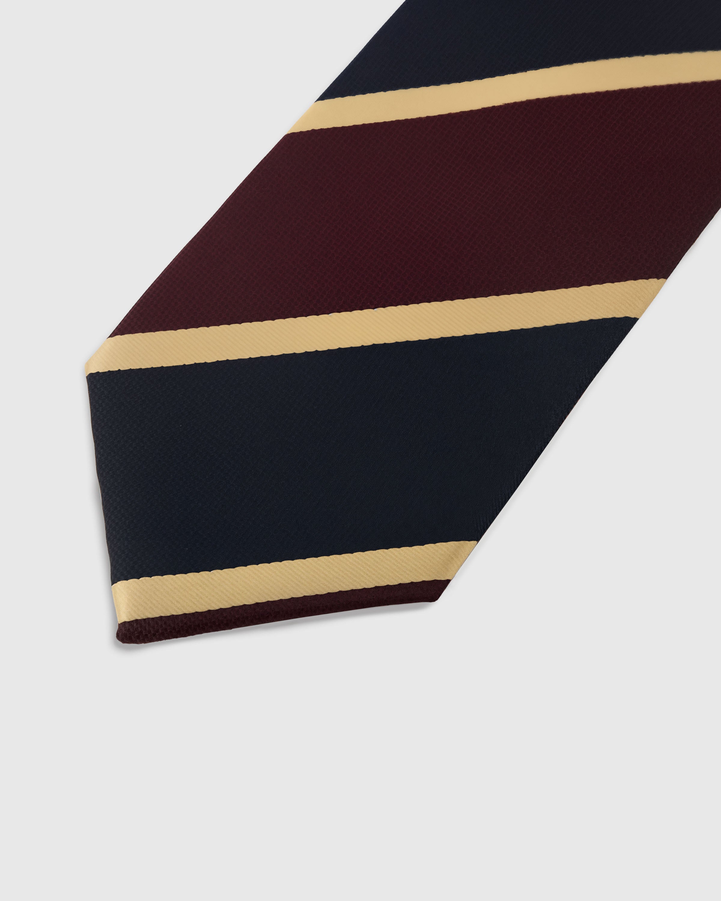 Tonal herringbone weave detail on burgundy mulberry silk tie showing diagonal zigzag texture by STICKYZOO