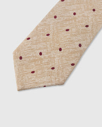 STICKYZOO Champagne Polka Tie — detail of hand-embroidered polka dot on pure mulberry silk