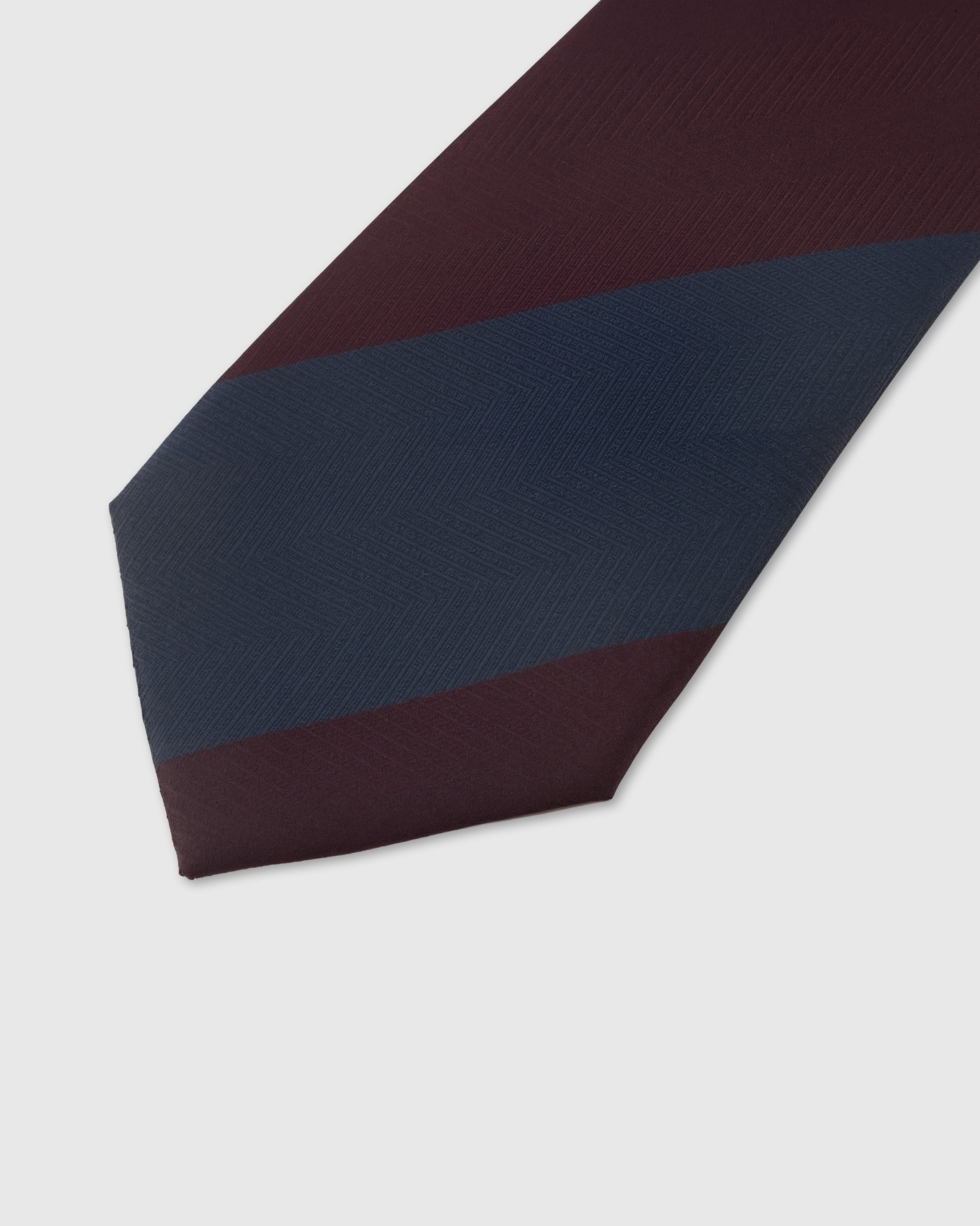 Claret and navy block stripe detail on mulberry silk tie showing herringbone weave texture by STICKYZOO