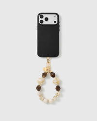 Handmade beaded phone strap on a black case, rated 4.9 across 5,000+ reviews