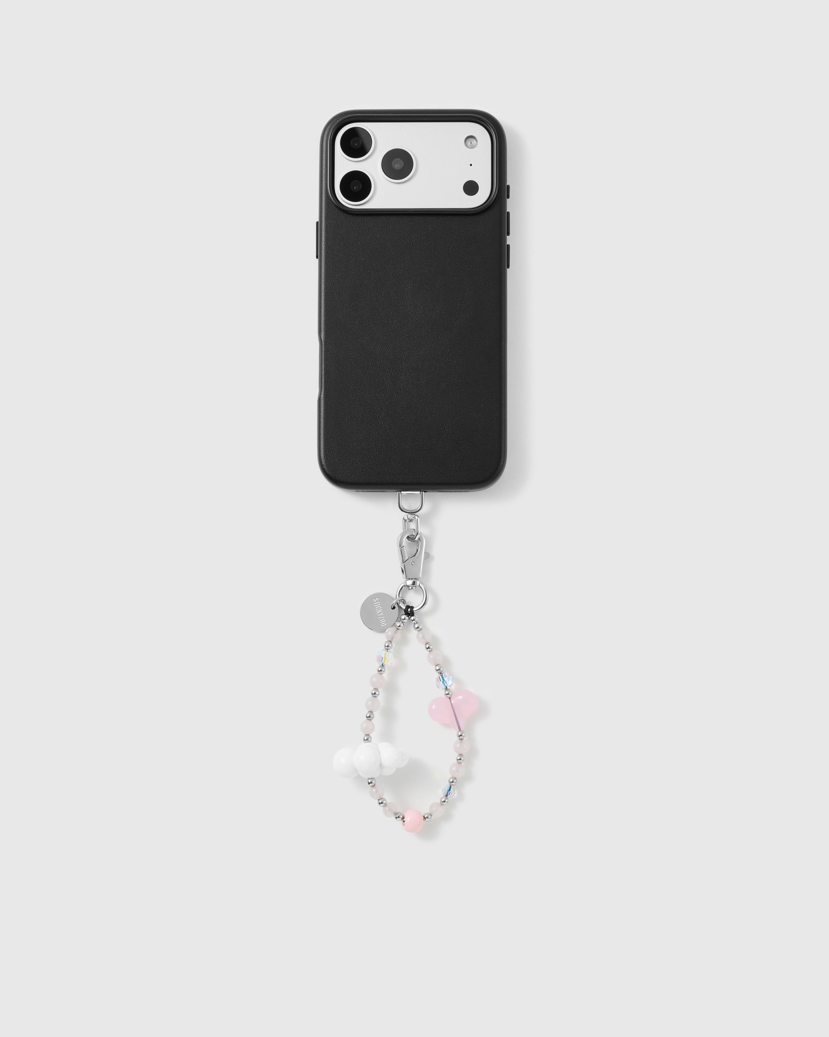 Handmade beaded phone strap on a black case, rated 4.9 across 5,000+ reviews