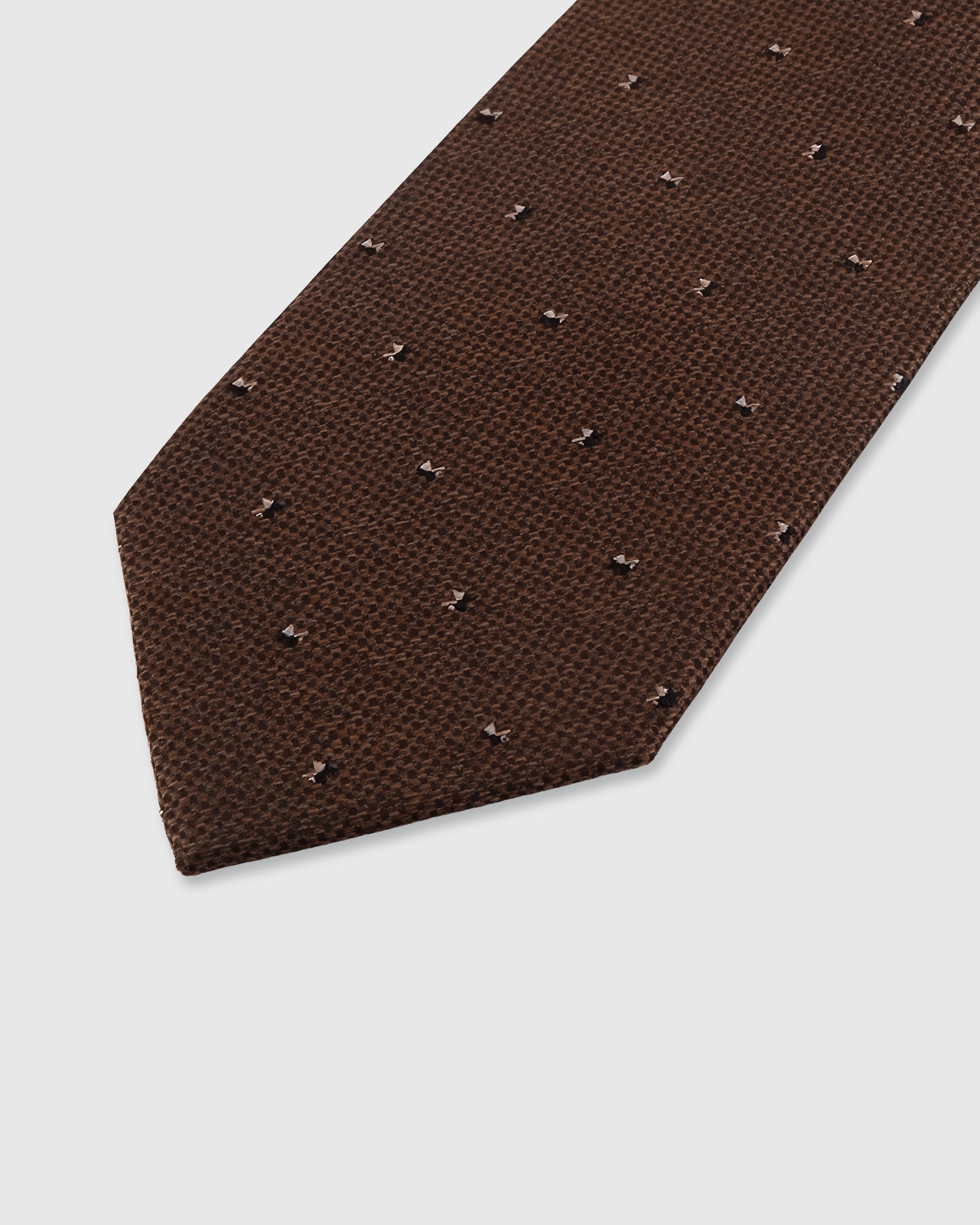 STICKYZOO Cocoa Pin Dot Tie — detail of hand-embroidered micro pin dot on pure mulberry silk