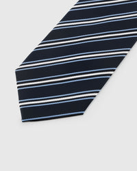 Sky blue and white regiment stripe detail on navy herringbone mulberry silk showing hand-embroidered thread by STICKYZOO