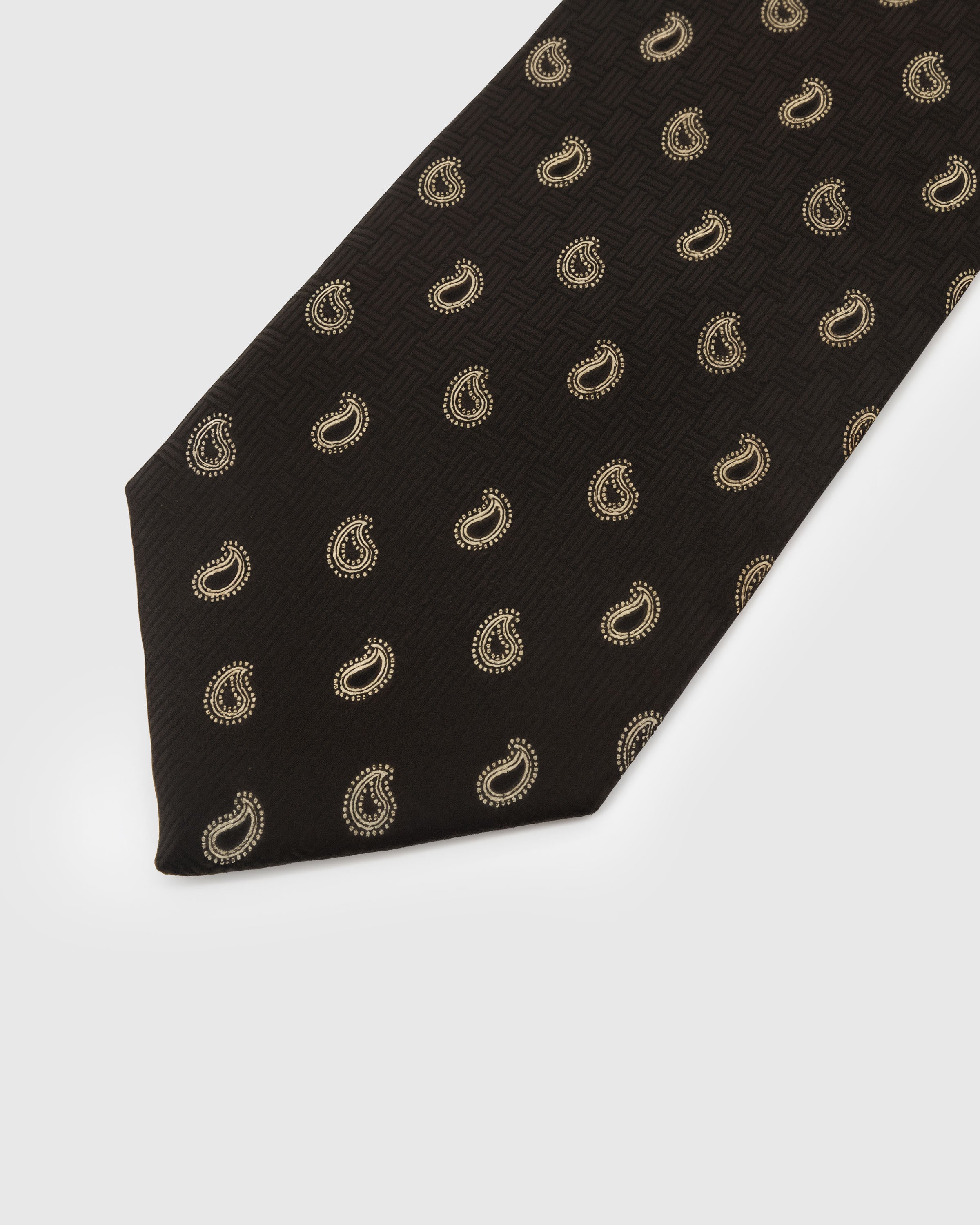 Gold paisley motif on midnight basket-weave silk tie showing hand-embroidered raised detail by STICKYZOO