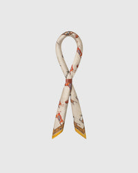 Saffron yellow border drape detail on the gallop patchwork silk scarf in archival inks