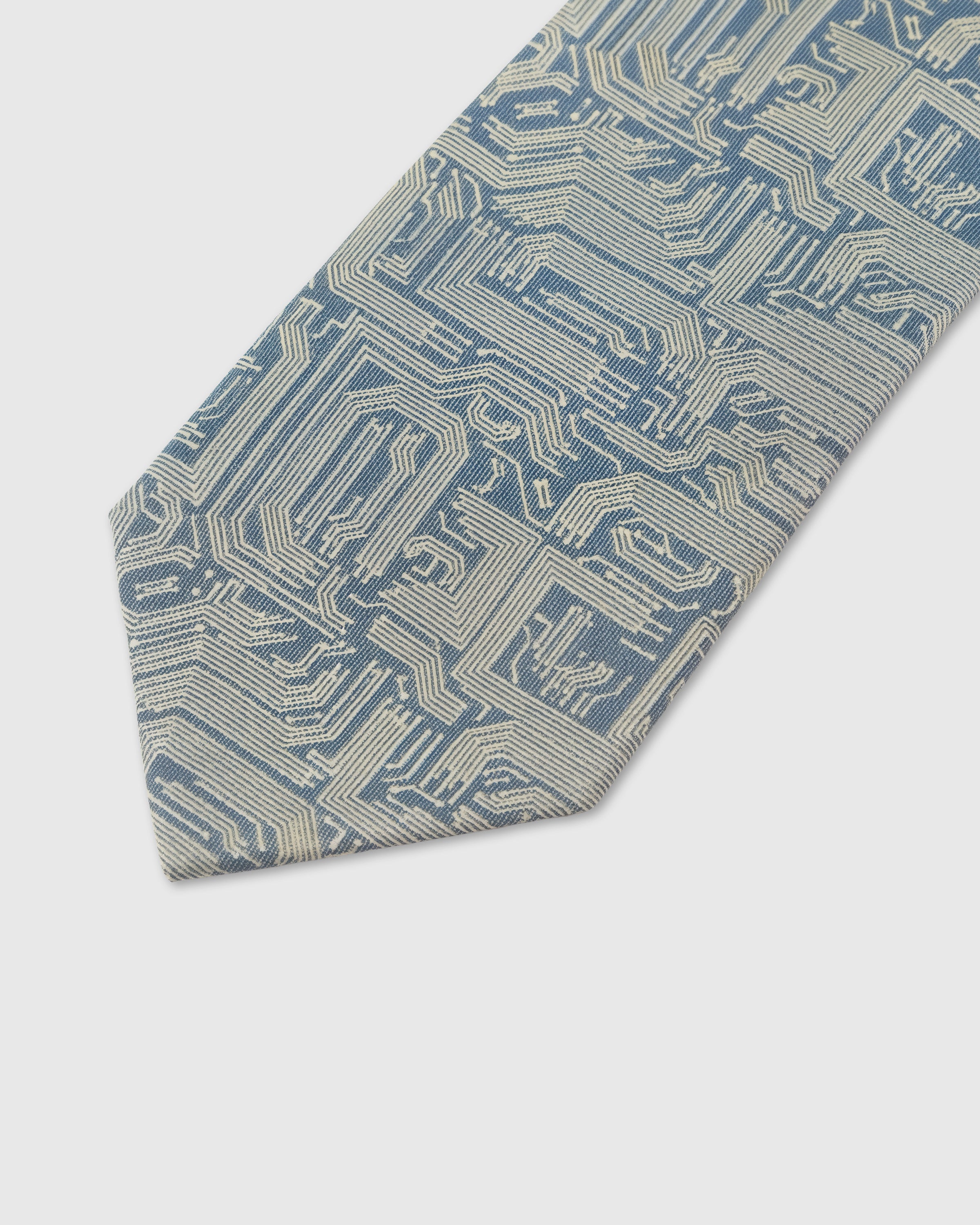 Circuit pattern detail on sage mulberry silk tie showing abstract linear jacquard weave by STICKYZOO