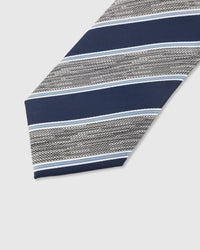 Woven silver stripe detail on navy mulberry silk tie showing textured hand-embroidered weave pattern by STICKYZOO