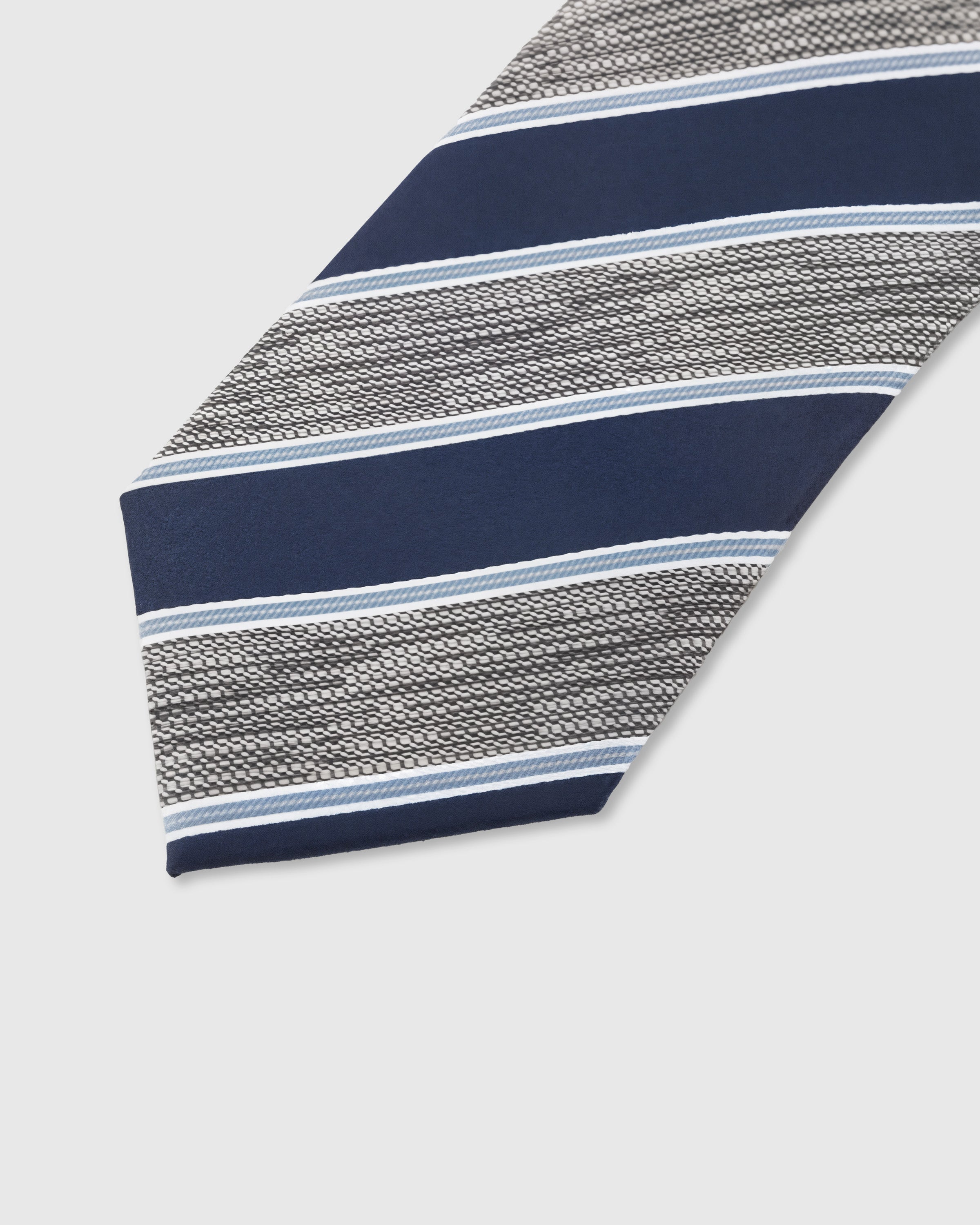Woven silver stripe detail on navy mulberry silk tie showing textured hand-embroidered weave pattern by STICKYZOO