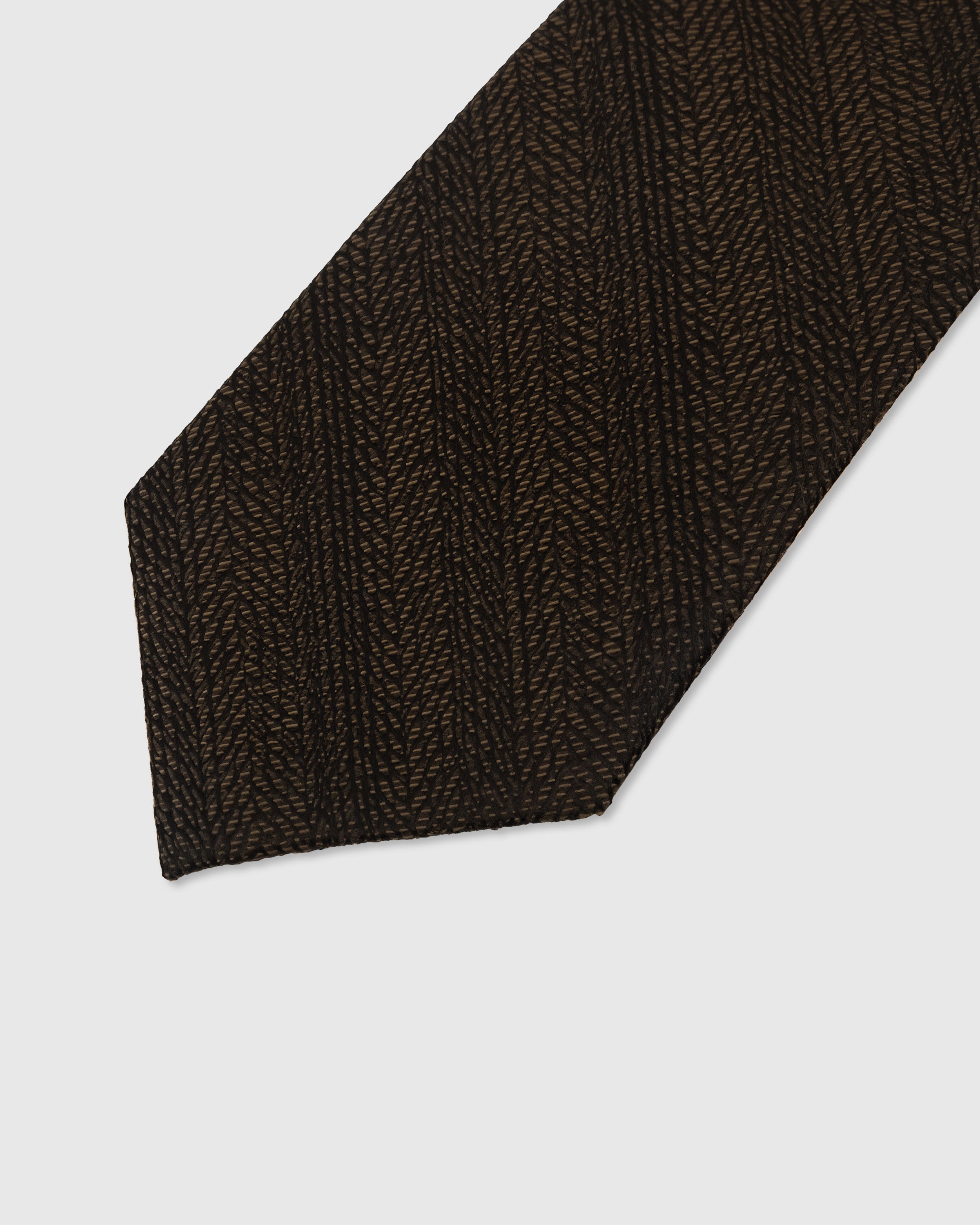 Herringbone weave detail on espresso mulberry silk tie showing tonal chevron texture woven through silk by STICKYZOO