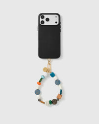 Handmade beaded phone strap on a black case, rated 4.9 across 5,000+ reviews