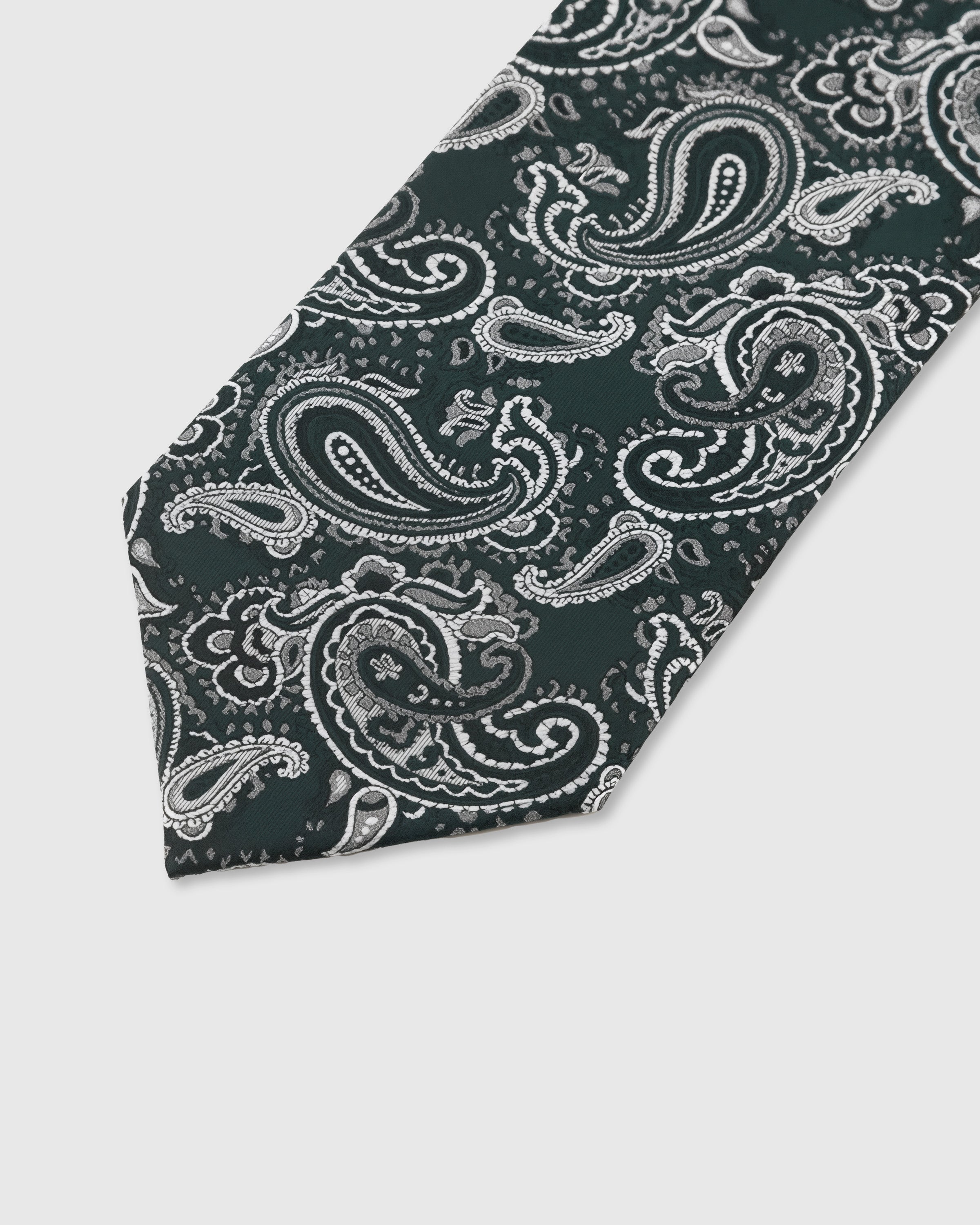 EVERGREEN PAISLEY TIE — 45° Italian bias-cut construction with structured interlining, hand-finished slip stitching visible on interior