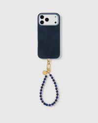 Handmade real stone phone strap on a black case, rated 4.9 across 5,000+ reviews