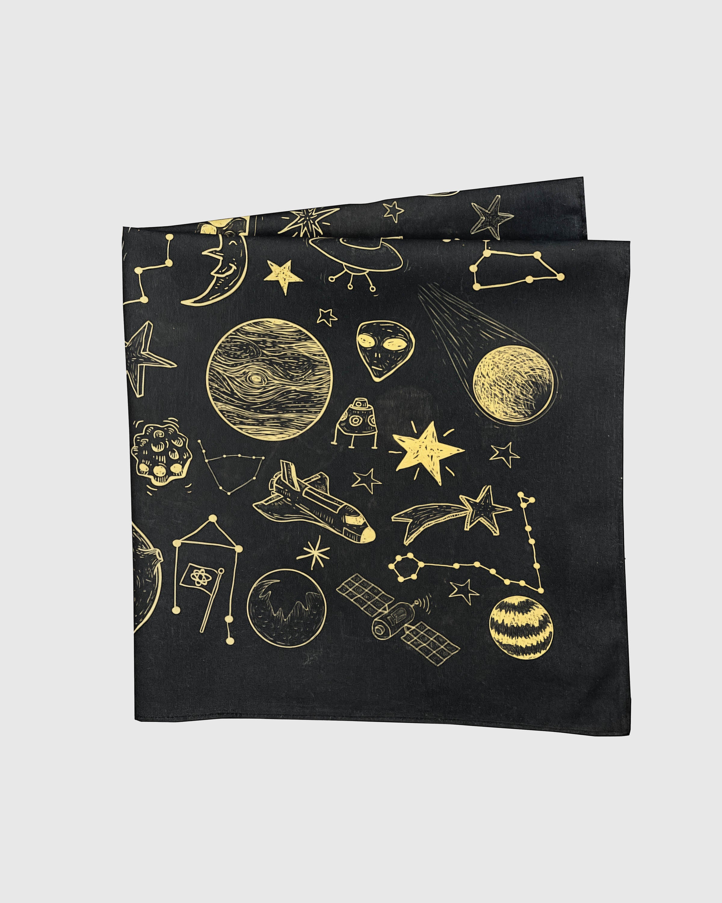 Black silk golden cosmos scarf folded to show the gold celestial motifs across the drape