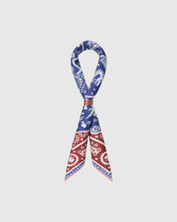 STICKYZOO storybook map silk scarf knotted through a leather ring showing the cobalt cartography
