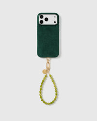 STICKYZOO jade-green stone beaded wrist strap on a full phone in a studio setting
