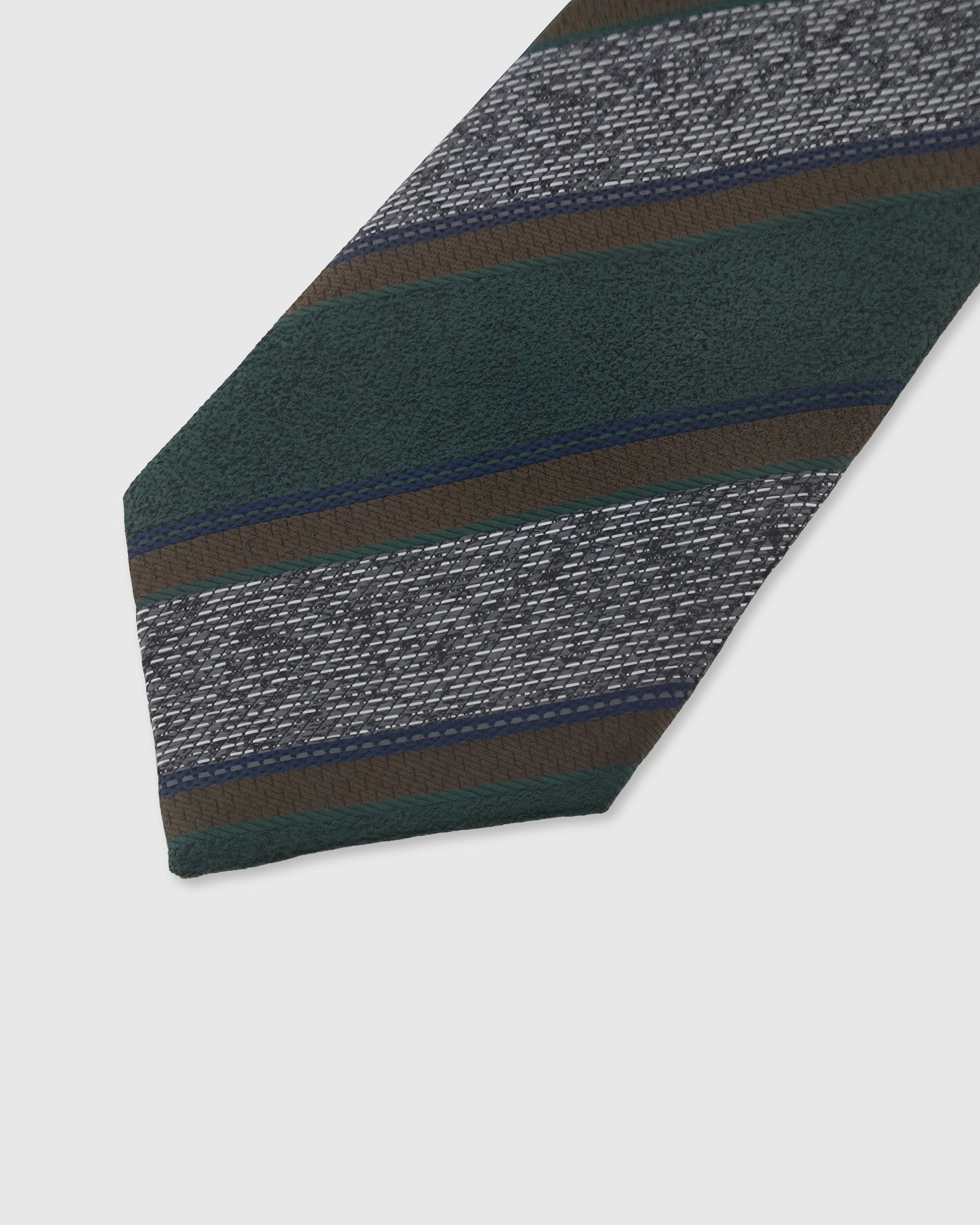Textured stripe detail on evergreen mulberry silk tie showing tweed and smooth weave contrast by STICKYZOO