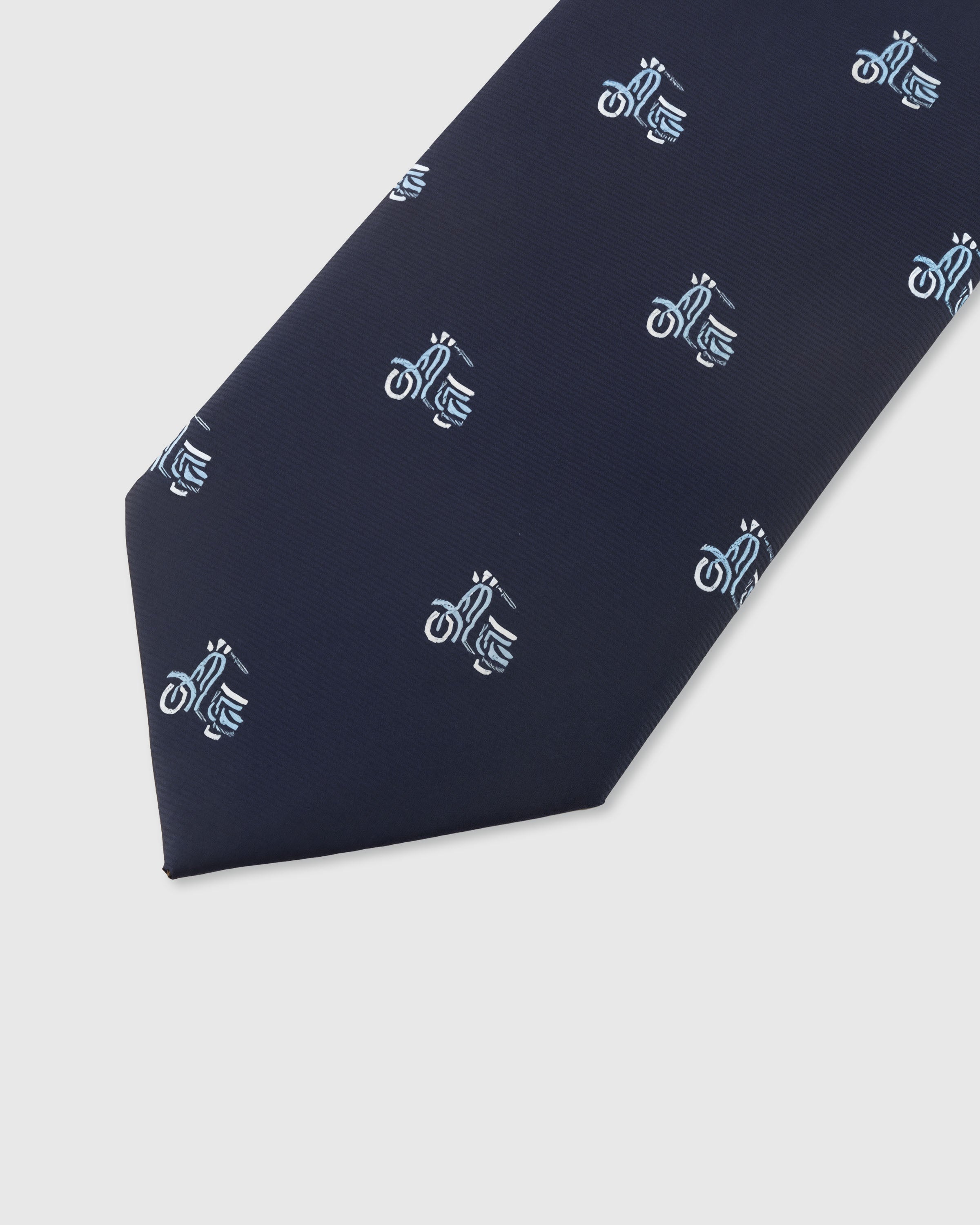 NAVY VESPA TIE — 45° Italian bias-cut construction with structured interlining, hand-finished slip stitching visible on interior