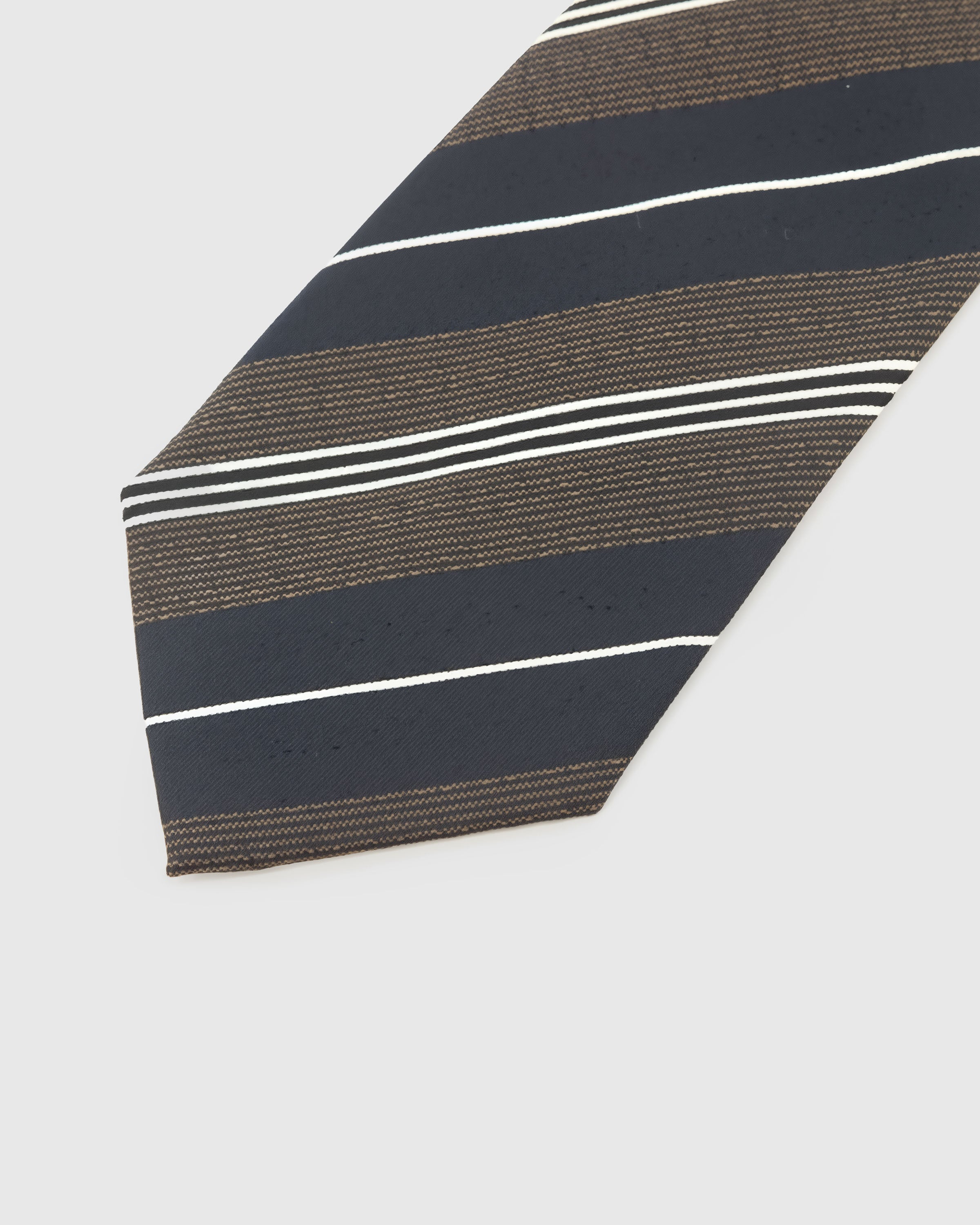 Rust and amber stripe detail on evergreen mulberry silk tie showing woven color bands by STICKYZOO