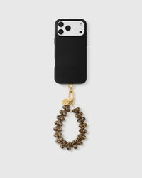 5,000 plus reviews full phone view with the smoke leopard heart strap clipped on, pattern catching the light across each bead