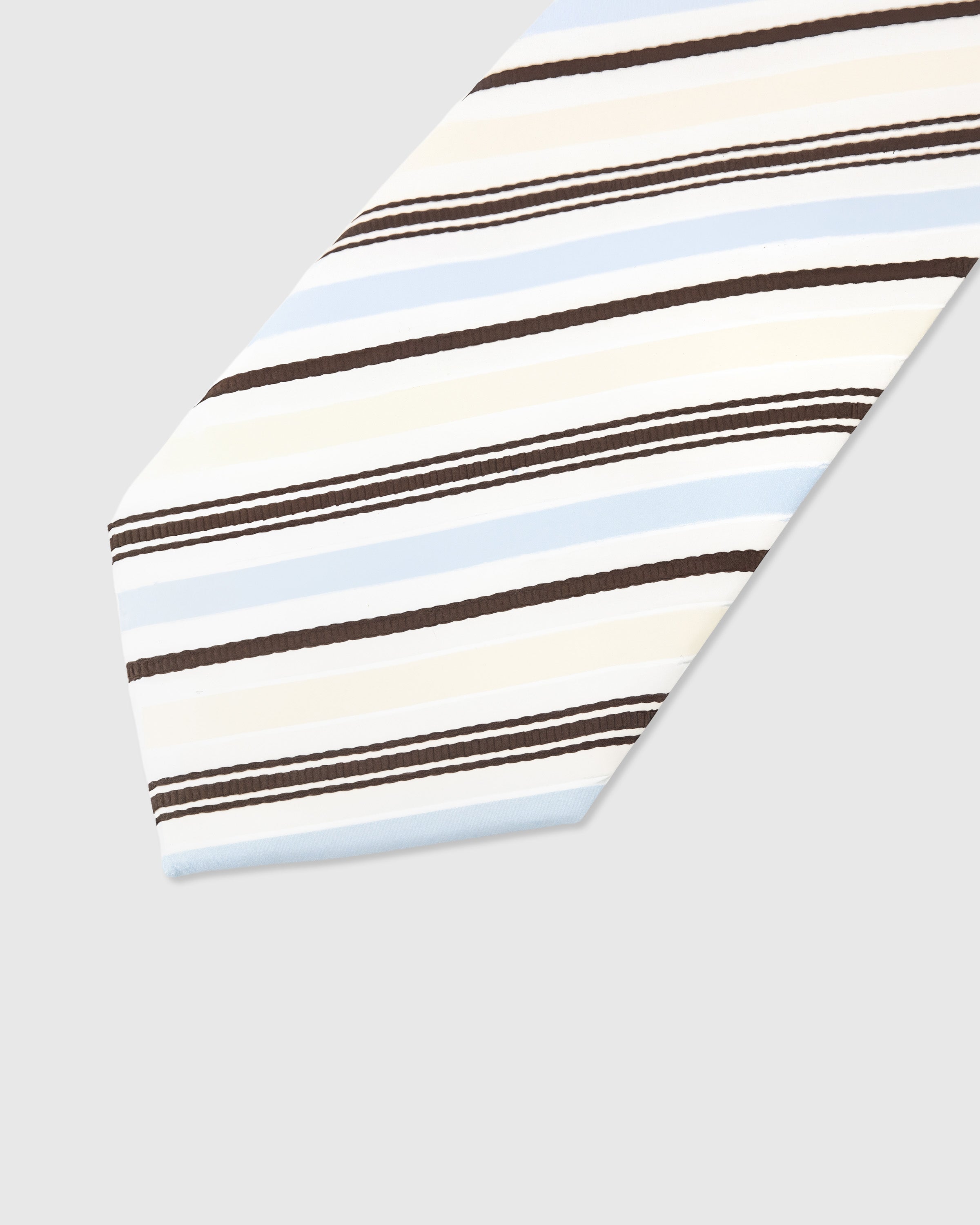 Coastal stripe detail on ivory mulberry silk tie showing woven sky-blue and chocolate transitions by STICKYZOO