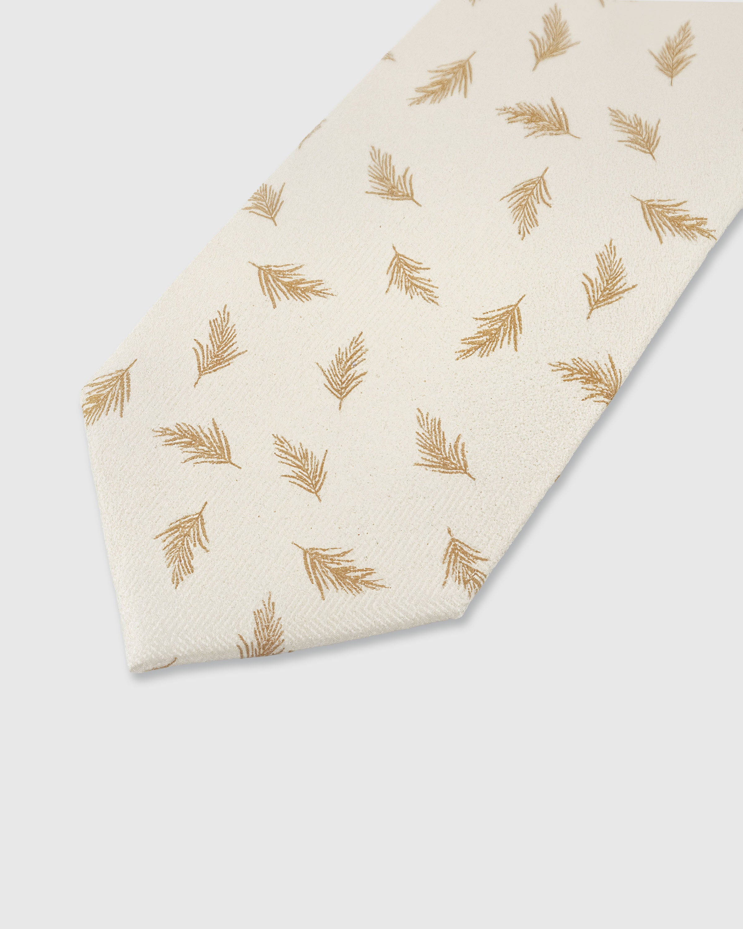 STICKYZOO Ivory Feather Tie — detail of hand-embroidered scattered feather on pure mulberry silk