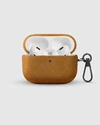 Camel Alcantara case open with AirPods Pro inside and suede-lined lid