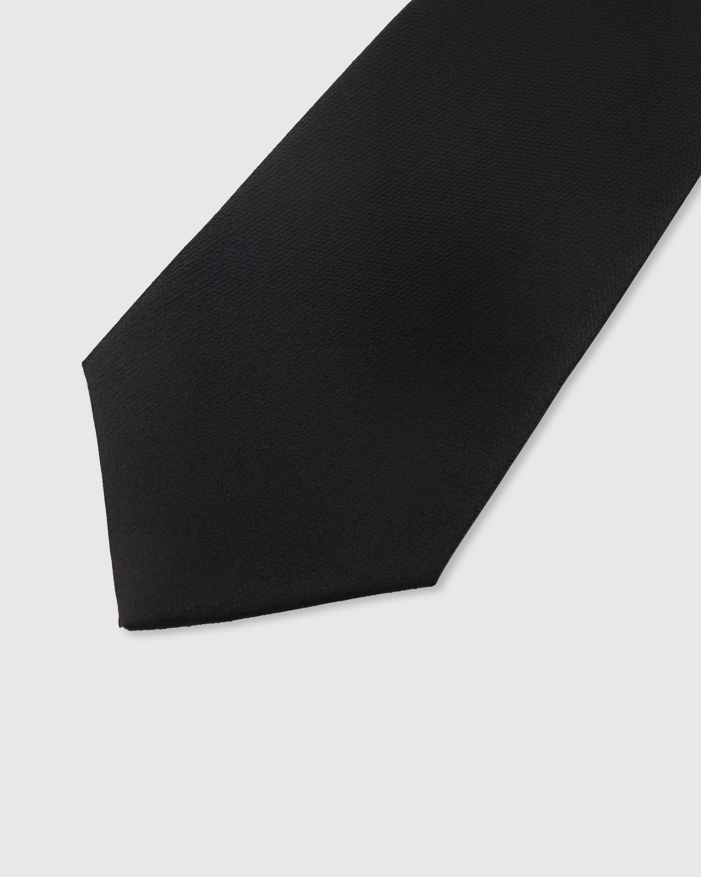 STICKYZOO Onyx Silk Tie — detail of hand-embroidered solid textured on pure mulberry silk
