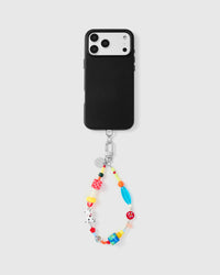 Full phone with dalmatian dice bead strap attached showing compatibility