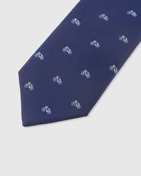 NAVY BICYCLE TIE — 45° Italian bias-cut construction with structured interlining, hand-finished slip stitching visible on interior