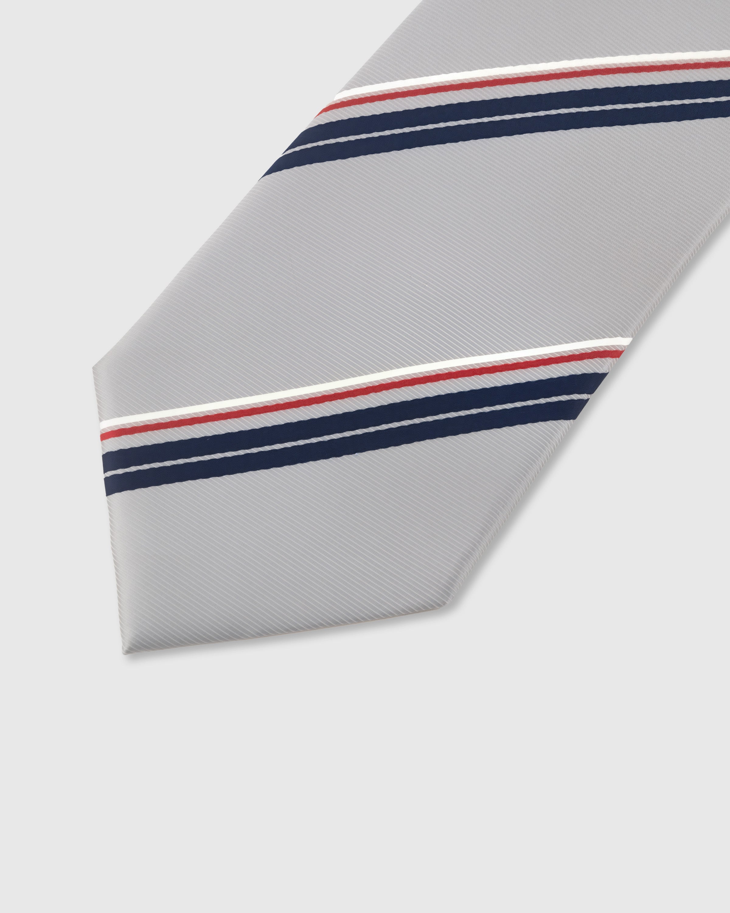Navy and crimson regimental stripe detail on sterling mulberry silk tie showing raised hand-embroidered thread by STICKYZOO