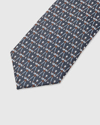 Geometric lattice detail on slate mulberry silk tie showing hand-embroidered copper accents by STICKYZOO
