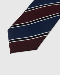 Regiment stripe detail on claret and steel blue mulberry silk tie showing raised hand-embroidered thread by STICKYZOO