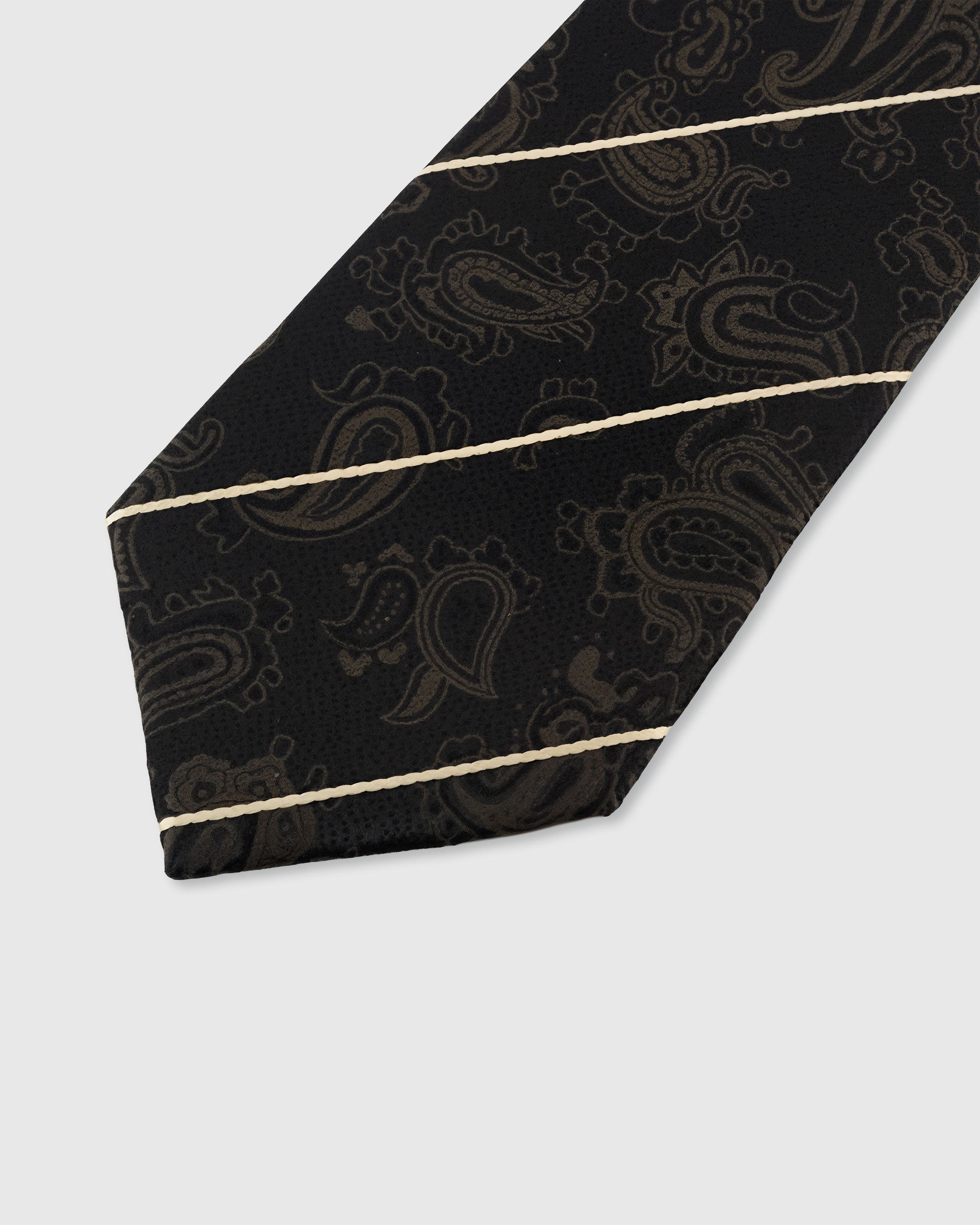 STICKYZOO NOIR PAISLEY GILT TIE — hand-embroidered detail showing tonal dark paisley with fine gold stripe accents, stitched not printed