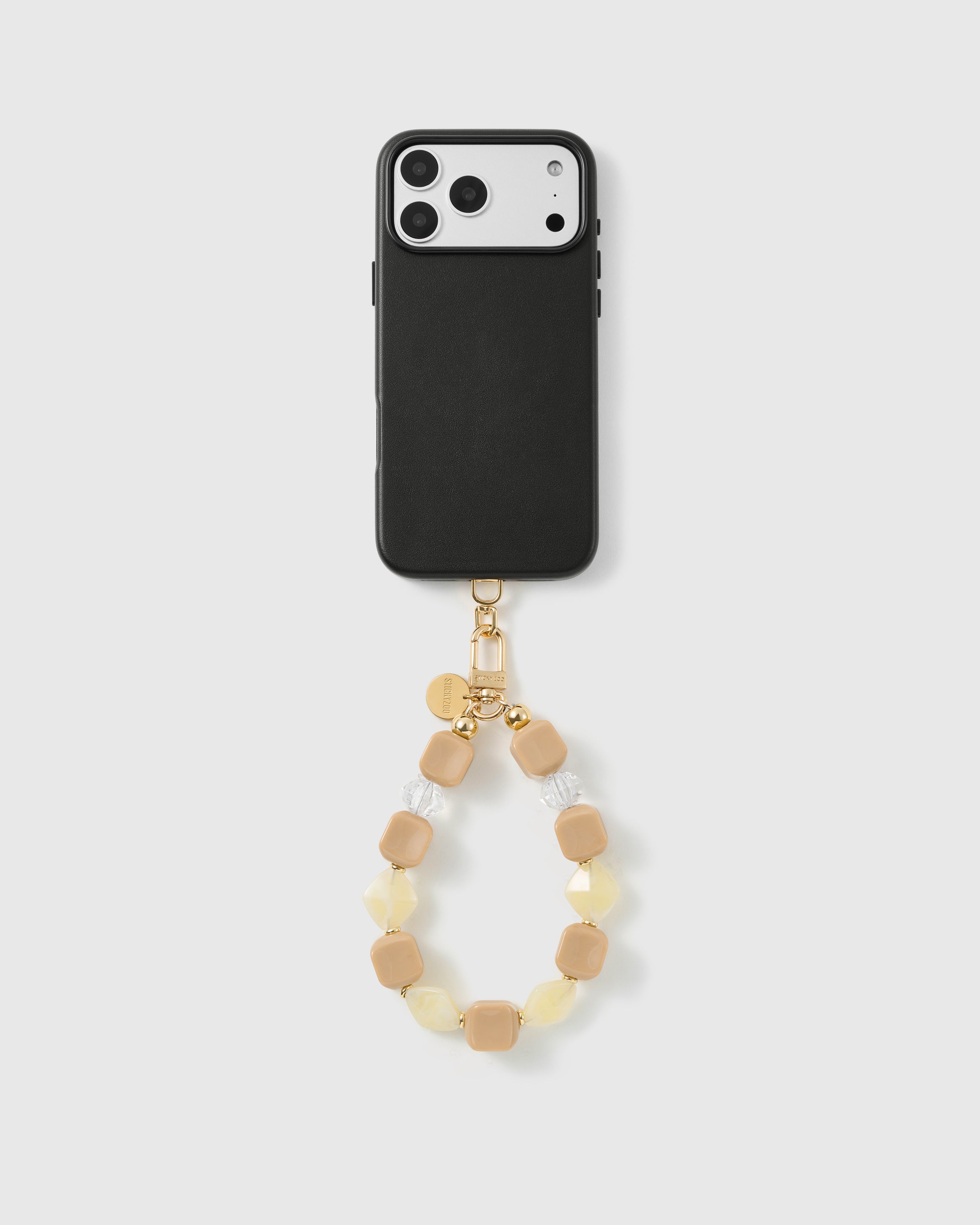 Handmade beaded phone strap on a black case, rated 4.9 across 5,000+ reviews