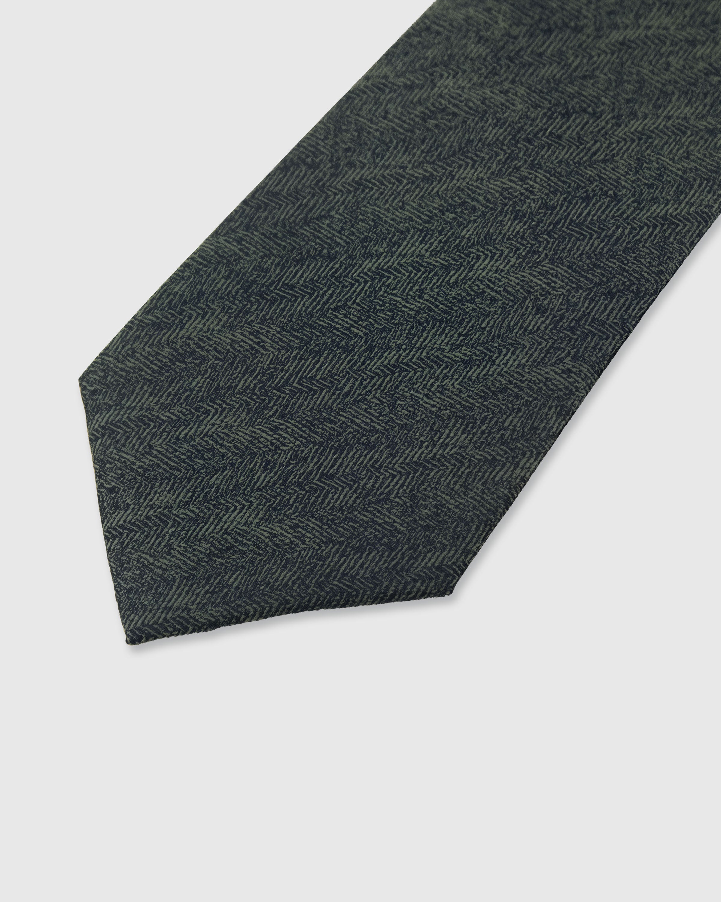 STICKYZOO Charcoal Herringbone Tie — detail of hand-embroidered herringbone weave on pure mulberry silk